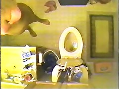 Voyeur spy cam filmed a sexy vixen stripping