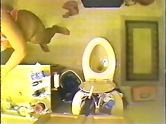 Voyeur spy cam filmed a sexy vixen stripping