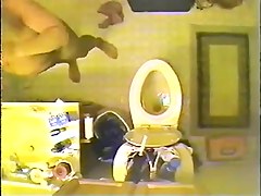 Voyeur spy cam filmed a sexy vixen stripping