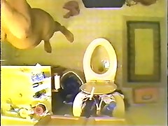 Voyeur spy cam filmed a sexy vixen stripping