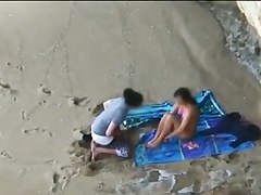 Beach candid camera shows slut having sex