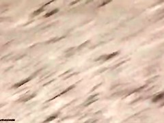 Beach candid camera filmed a horny vixen