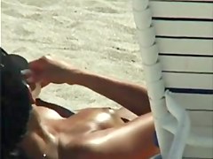 Candid beach camera filmed a horny bimbo