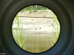 Voyeur spycam on the beach