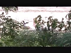voyeur catches MILF on a beach