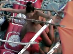 Voyeur on public beach.Wife fuck the hubby with Strapon