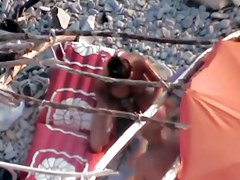 Voyeur on public beach.Wife fuck the hubby with Strapon