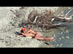 Couple fucking on a public beach, while walking past people