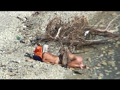 Couple fucking on a public beach, while walking past people