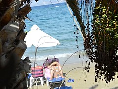 Open legs bikini mature