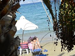 Open legs bikini mature