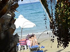 Open legs bikini mature