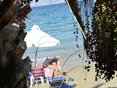 Open legs bikini mature