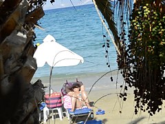 Open legs bikini mature