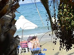 Open legs bikini mature