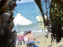 Open legs bikini mature