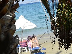 Open legs bikini mature