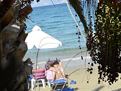 Open legs bikini mature