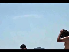 Couple split by Strangers on a nude beach