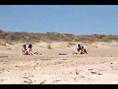 Couple split by Strangers on a nude beach