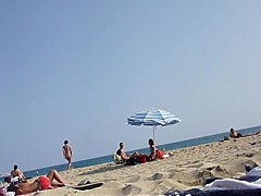 Walking naked on the beach