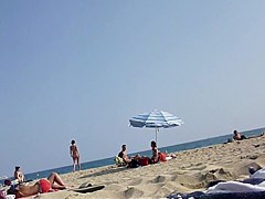 Walking naked on the beach