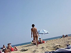 Walking naked on the beach