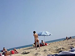 Walking naked on the beach