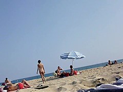 Walking naked on the beach