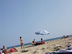 Walking naked on the beach