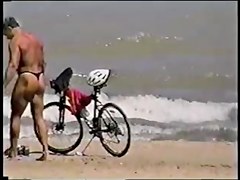 fellows in strap on the beach