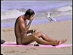 fellows in strap on the beach