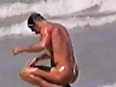 fellows in strap on the beach