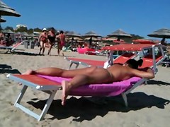 Worthy strap butt on the beach