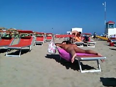 Worthy strap butt on the beach