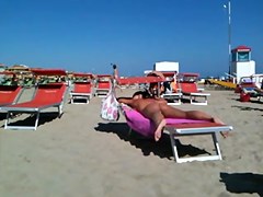 Worthy strap butt on the beach