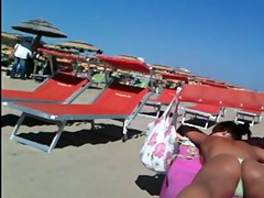 Worthy strap butt on the beach