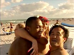 Kinky girls tease hard in a hot voyeur beach group fun