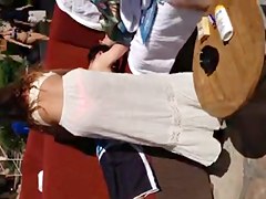Watch thru white suit showing pink belt