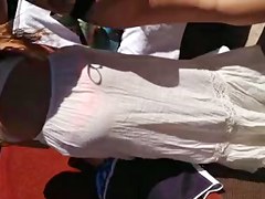 Watch thru white suit showing pink belt