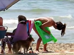 Topless legal age teenager with not her grandfathers at beach