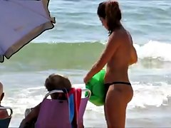 Topless legal age teenager with not her grandfathers at beach