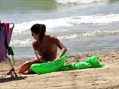 Topless legal age teenager with not her grandfathers at beach