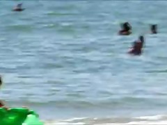 Topless legal age teenager with not her grandfathers at beach