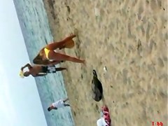 ASTOUNDING GREEK JUVENILE. YELLOW BIKINI AT THE BEACH TEASING US