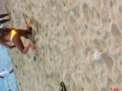 ASTOUNDING GREEK JUVENILE. YELLOW BIKINI AT THE BEACH TEASING US