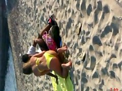 ASTOUNDING GREEK JUVENILE. YELLOW BIKINI AT THE BEACH TEASING US