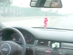 Blowjob in car on the highway