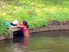 Chubby Brazilian chick takes a quick swim in the local river