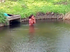Chubby Brazilian chick takes a quick swim in the local river